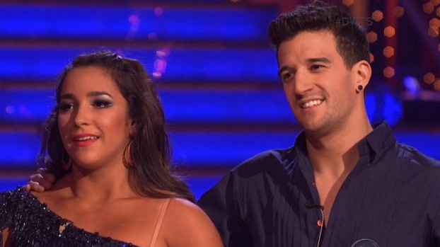 Aly Raisman and Mark Ballas dance the samba on Dancing With The Stars side by side with two pro dancers.