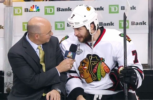 Chicago Blackhawks, Brent Seabrook , speakers with Pierre McGuire after his OT winning slapsot in Game 5 of the Stanley Cup Fonals against the Boston Bruins on June 18, 2013.