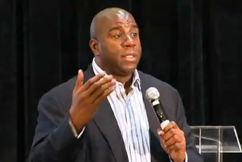 Photo shows magic Johnson speaking at the at the 2009 Diversity Alliance for Science Conference in NJ.