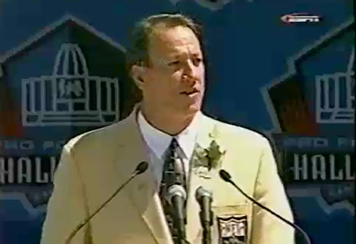 Photo shows Jim Kelly delivering his Hall of Fame speech.