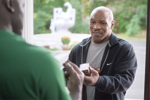 Photo shows Mike Tyson returning Evander Holyfield's bitten ear in an hilarious Foot Locker commercial titled "All i is Right," which fantasizes about a perfect world.