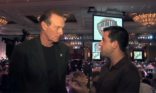 Photo shows Hall of Famer, Rick Barry, speaking to Harry Cicma in a 2011 interview..