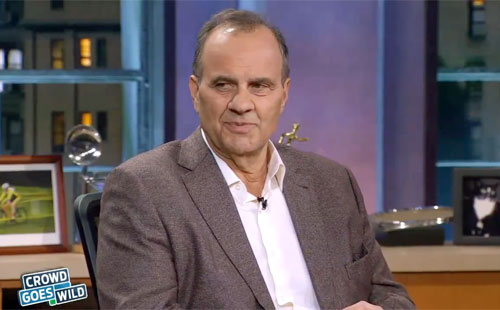 Photo shows former MLB manager,  Joe Torre, speaking to FOXSports about his Hall of Fame induction phone call.