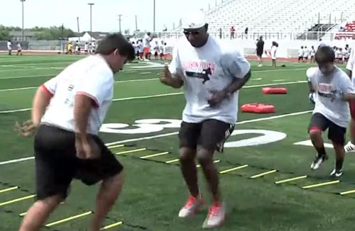 eric-dickerson-teaches-skills-judson-education-foundation-youth-football-camp-2013